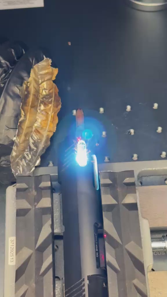A video of a gun slide receiving the barrel porting performed by a fiber laser